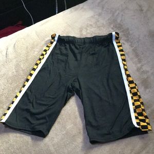 Black and yellow checkered bike shorts